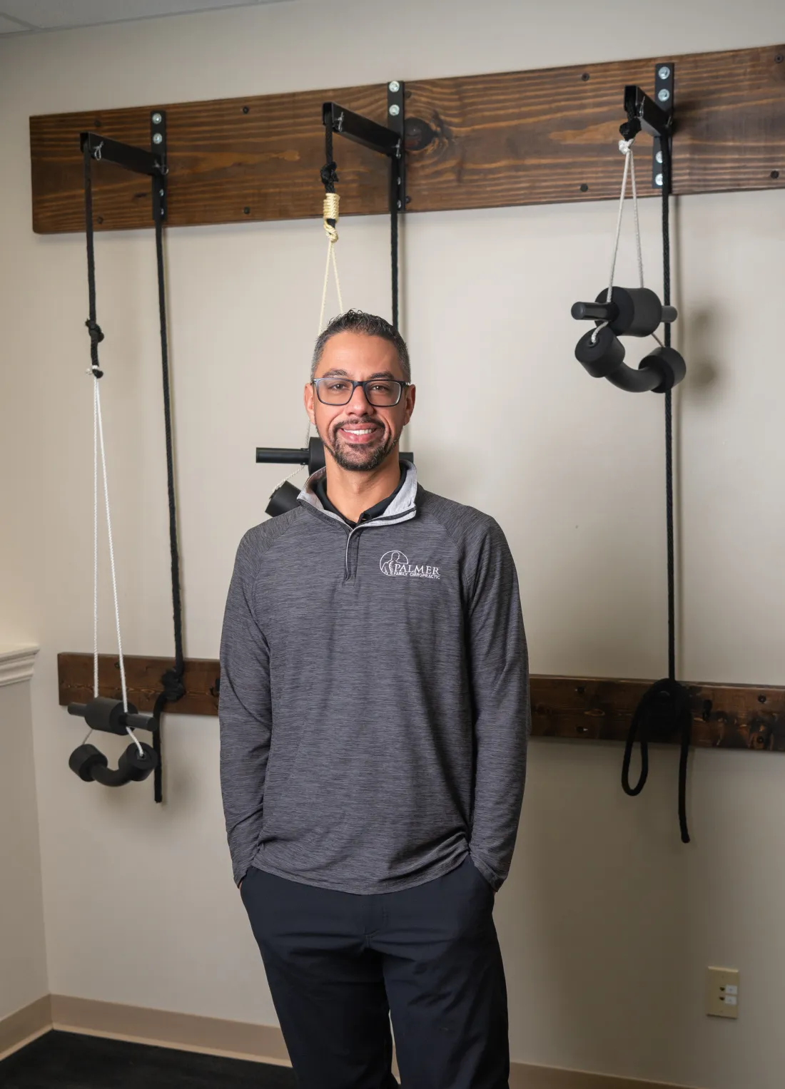Dr. James Palmer standing in the rehabilitation area