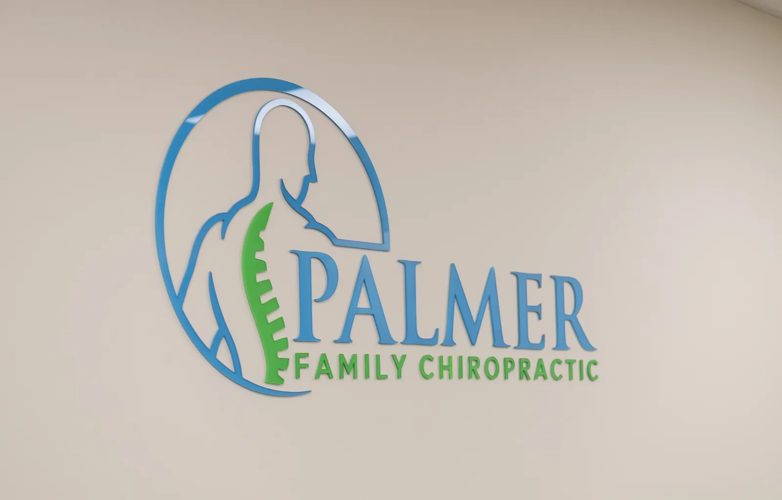 Palmer Family Chiropractic logo on the side of a practice vehicle