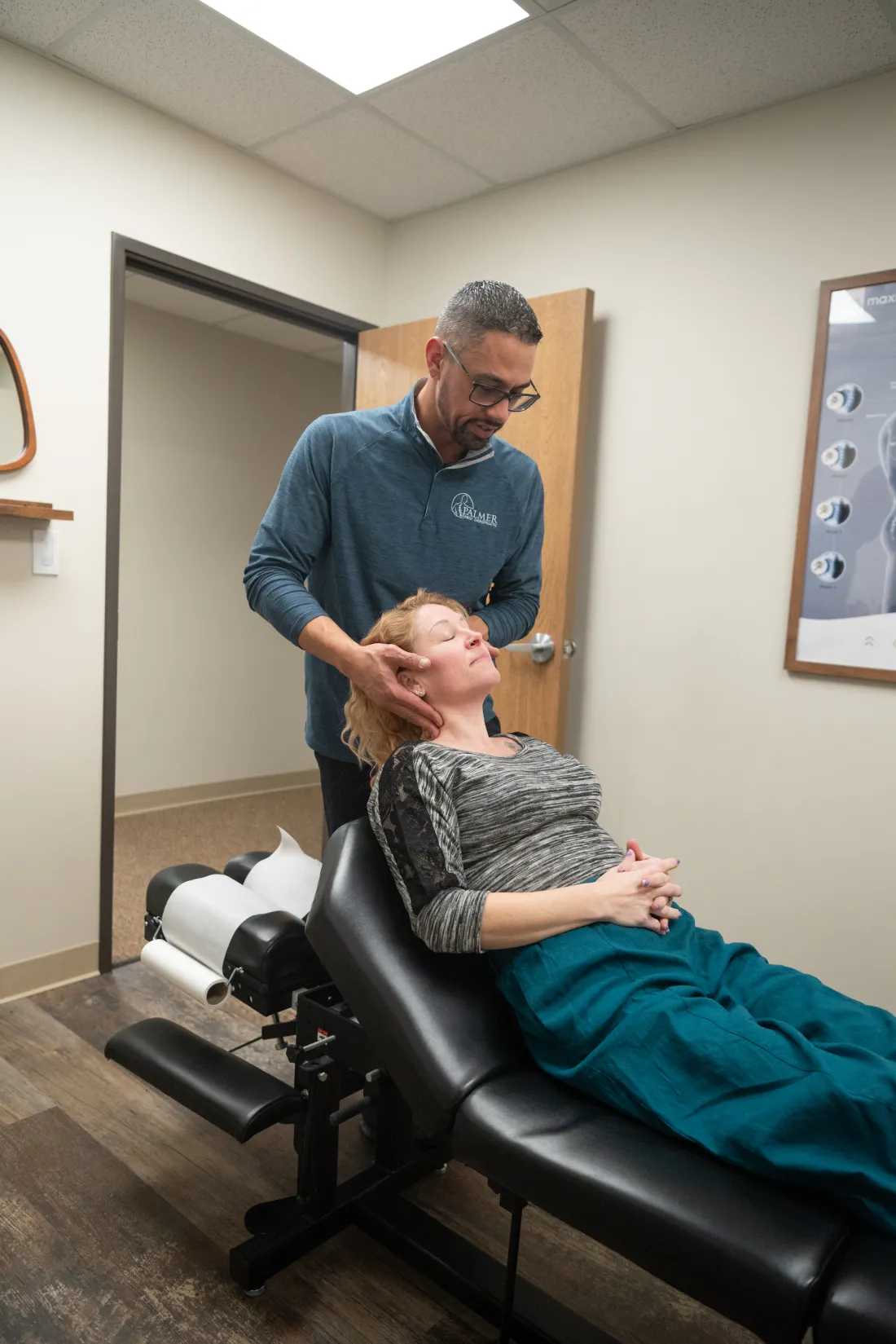 Dr. James Palmer positioning a patient for cervical care